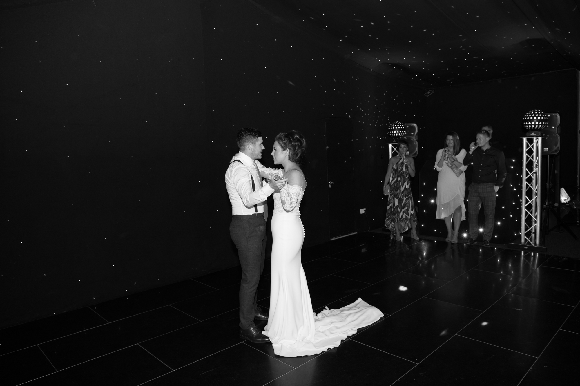 A bride and groom having their first dance at Chippenham park in Cambridgeshire